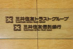 Sumitomo Mitsui Trust Bank sign and logo